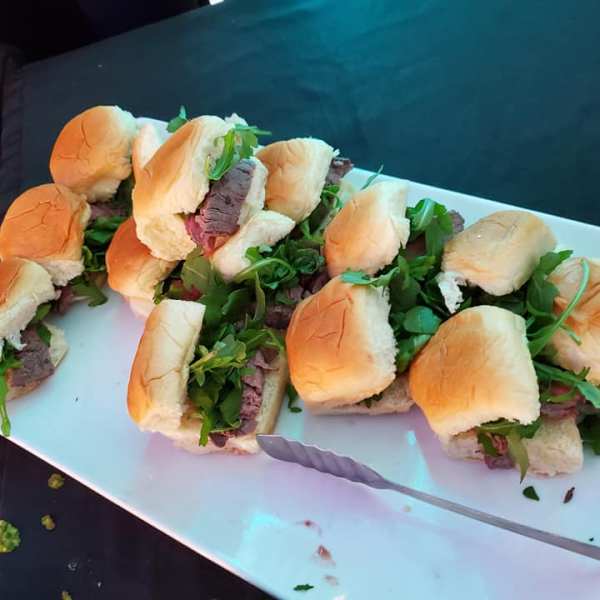 a plate of food with a sandwich and a salad