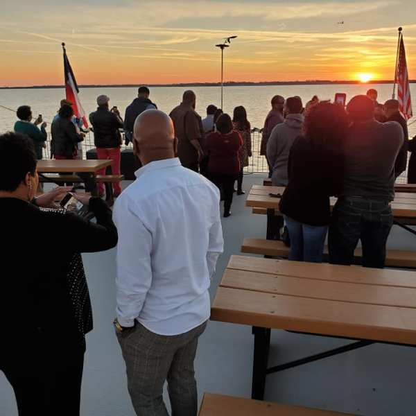 a group of people standing in front of a crowd