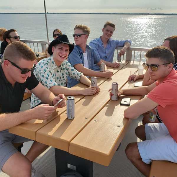 a group of people sitting at a table